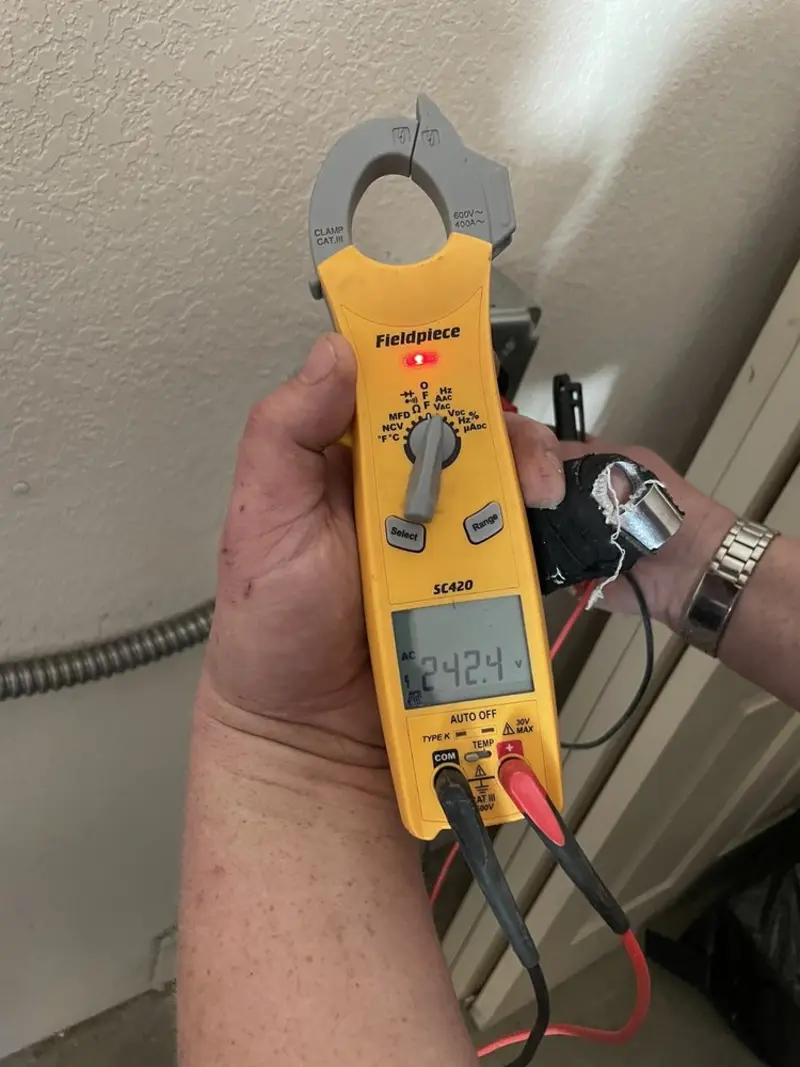 Voltage testing with clamp meter during Generator Installation in Humboldt Hill